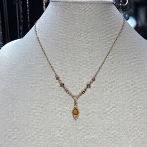 Elegant Gold Tone Necklace with Amber Pendant